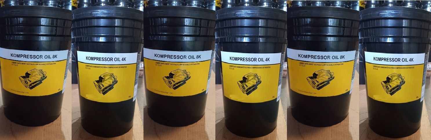 Five black barrels of Kompressor Oil 4K with yellow labels and a compressor illustration.